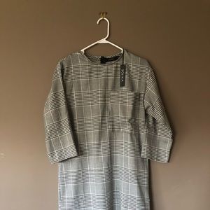 Solika’s Plaid Midi Dress